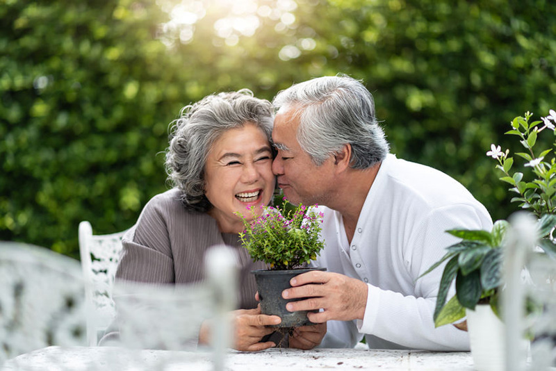 Retired couple gardening